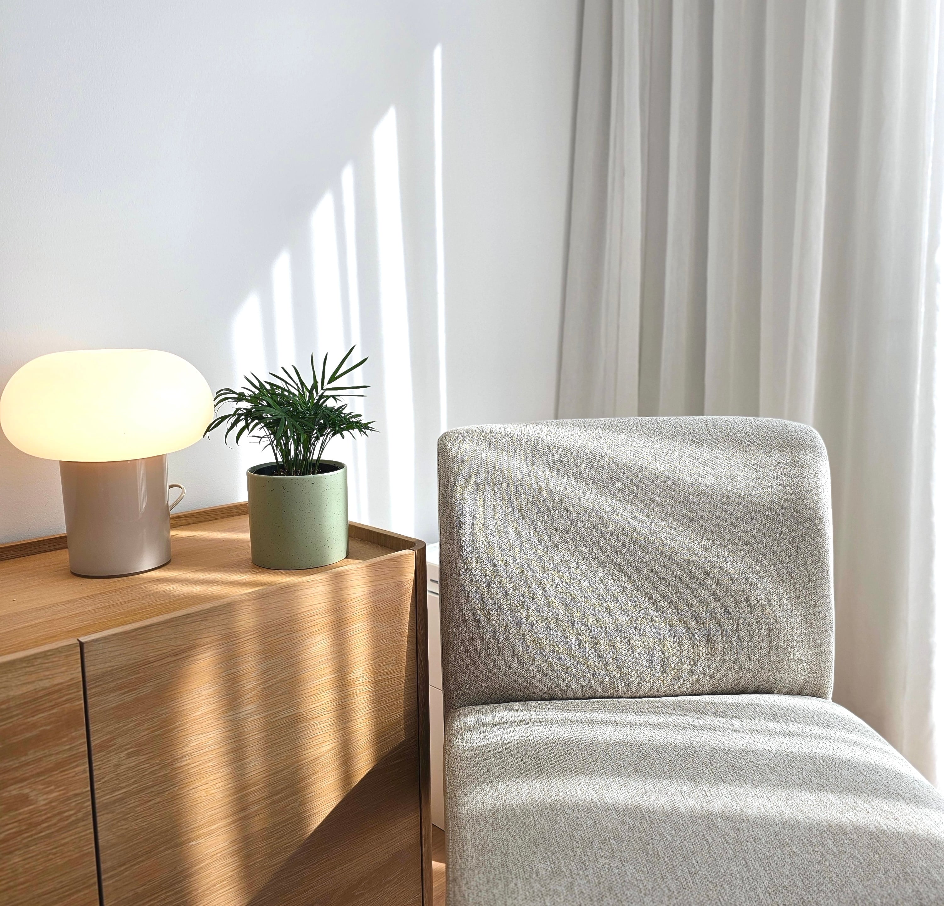 Therapy room with upholstered chair and natural light